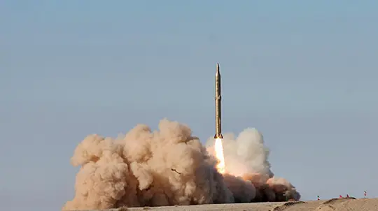 Iran Says US Warships Hit in Strait of Hormuz Clash