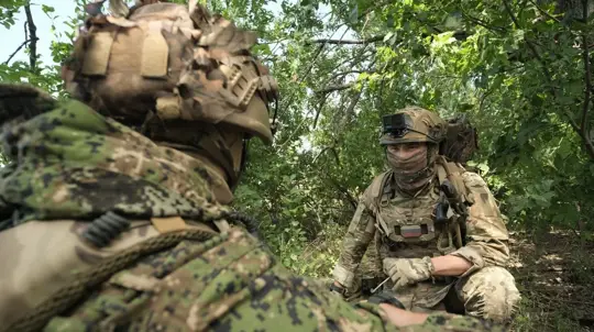 Russian Troops Evade Ukrainian Drones With Camouflage Ponchos