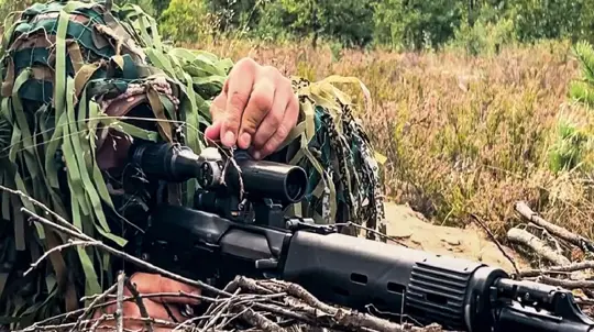 Russian Sniper Kills Hidden Ukrainian Machine Gunner